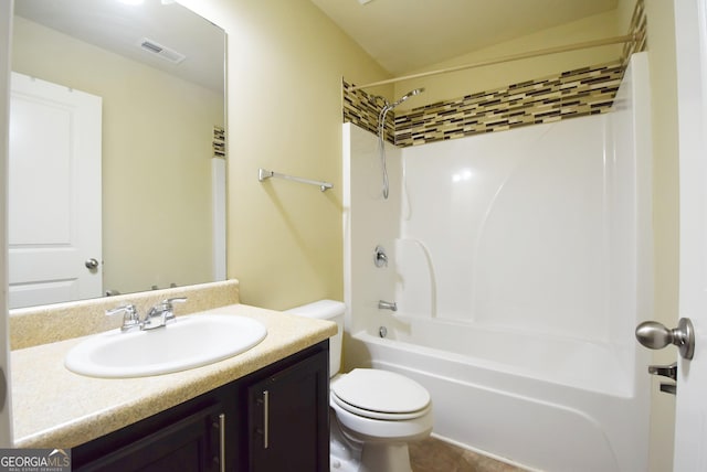 full bathroom featuring tile patterned floors, vanity, bathtub / shower combination, toilet, and visible vents