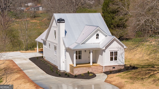 405 Roper Dr, Clarkesville, GA 30523 - modern farmhouse featuring crawl space, a chimney, driveway, covered porch, and metal roof