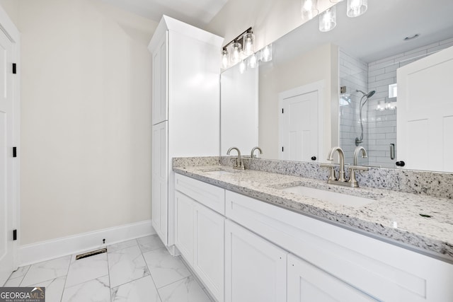 405 Roper Dr, Clarkesville, GA 30523 - bathroom with a shower stall, visible vents, baseboards, and a sink