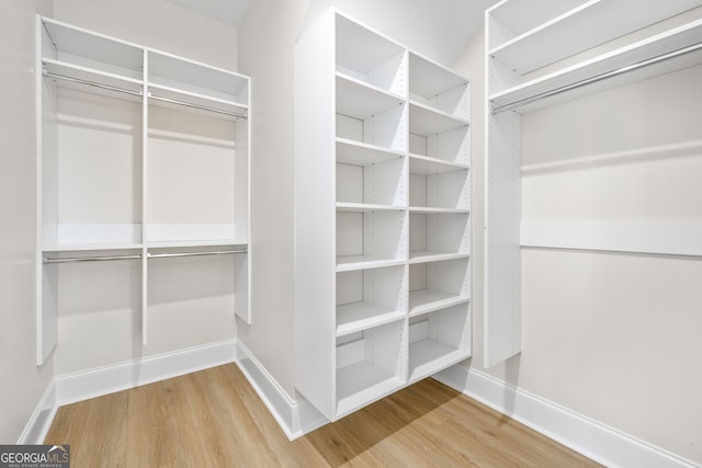 405 Roper Dr, Clarkesville, GA 30523 - walk in closet featuring wood finished floors
