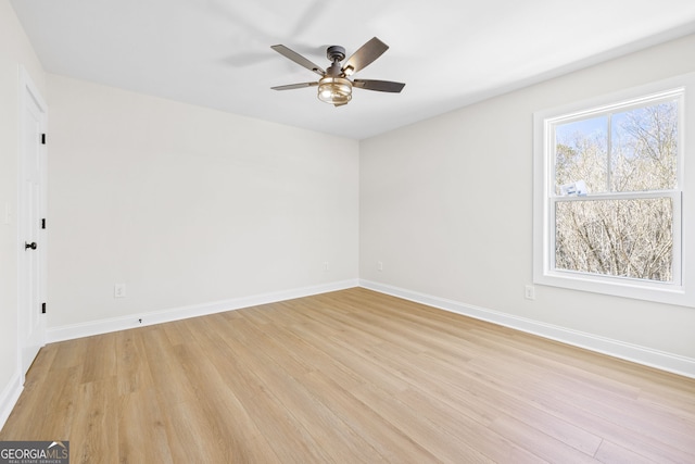 405 Roper Dr, Clarkesville, GA 30523 - empty room with baseboards, a ceiling fan, and light wood-type flooring