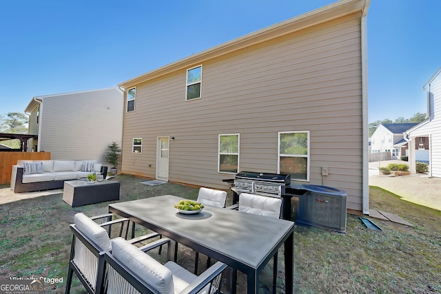 rear view of house with an outdoor hangout area, a patio area, outdoor dining area, and central AC unit