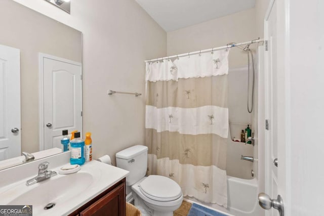 full bath featuring shower / tub combo, toilet, and vanity