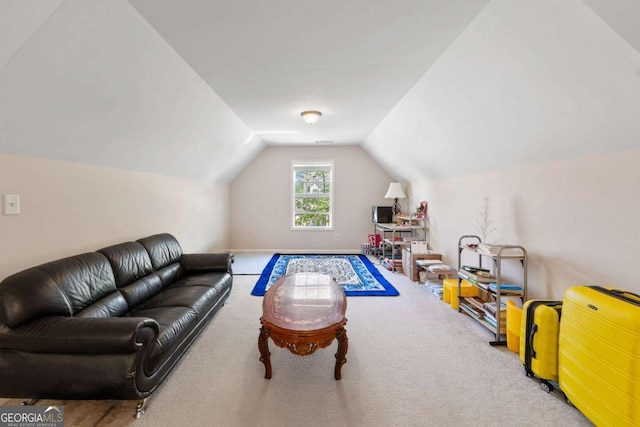 rec room featuring carpet floors and vaulted ceiling