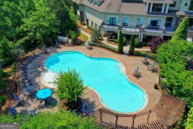 pool featuring a patio area