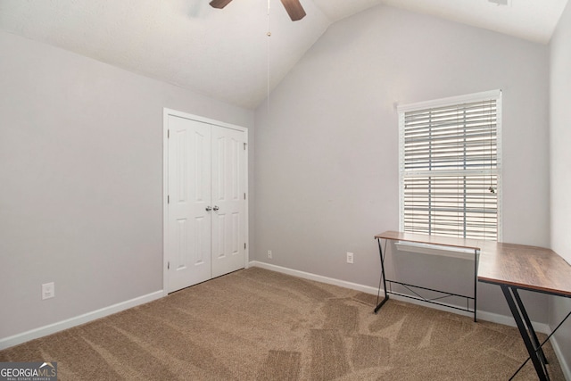 5 Stony Oak Dr, Newnan, GA 30263 - unfurnished bedroom with lofted ceiling, carpet, baseboards, a closet, and a ceiling fan