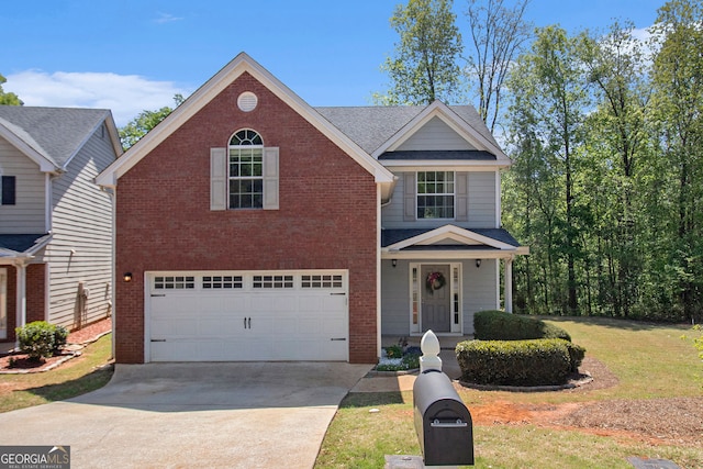 5 Stony Oak Dr, Newnan, GA 30263 - traditional home with an attached garage, brick siding, concrete driveway, and a front yard