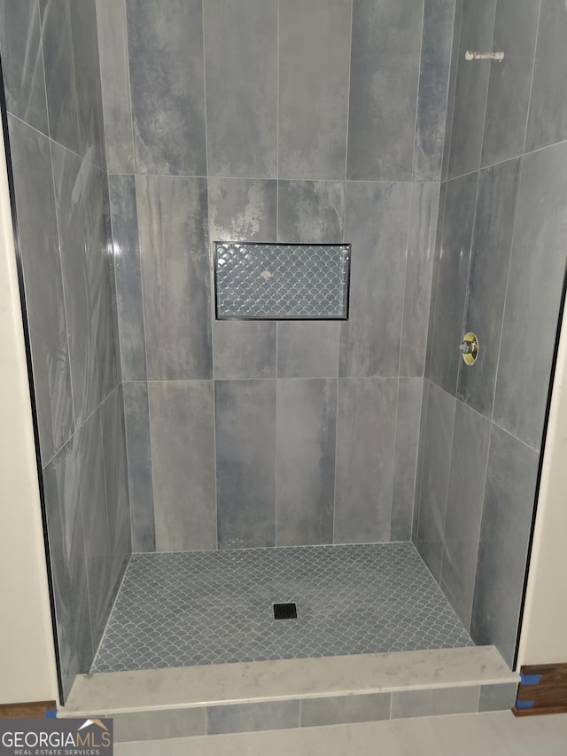 211 Lake Chase Dr N, Griffin, GA 30224 - bathroom featuring a tile shower