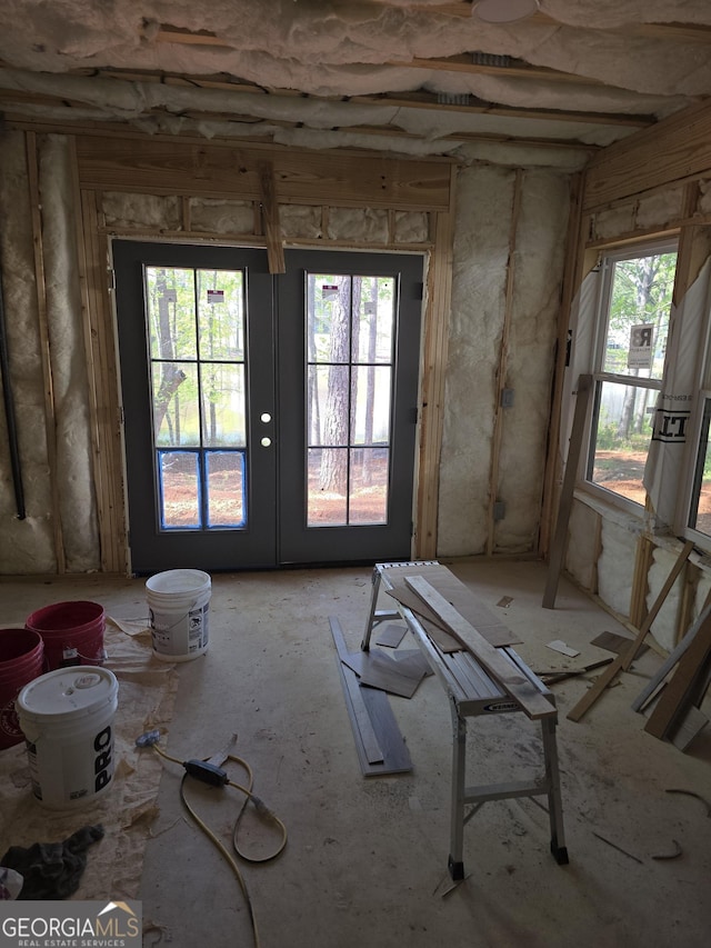unfurnished room with french doors