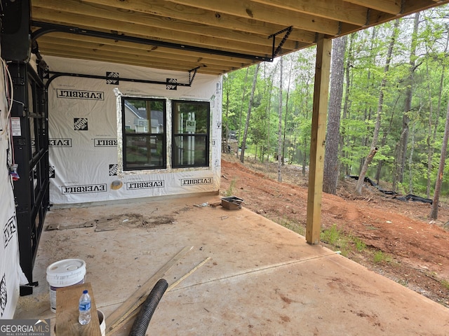 211 Lake Chase Dr N, Griffin, GA 30224 - view of patio / terrace with a wooded view