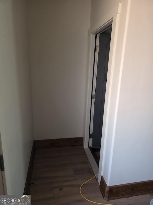 211 Lake Chase Dr N, Griffin, GA 30224 - hall with dark wood-style flooring and baseboards