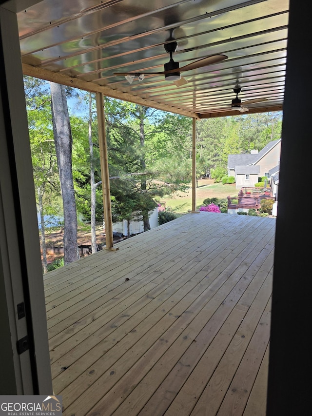 211 Lake Chase Dr N, Griffin, GA 30224 - deck with a ceiling fan and view of scattered trees