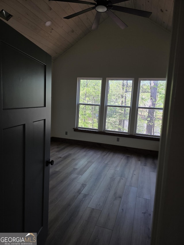 211 Lake Chase Dr N, Griffin, GA 30224 - spare room with a ceiling fan, wood ceiling, lofted ceiling, dark wood-style floors, and baseboards