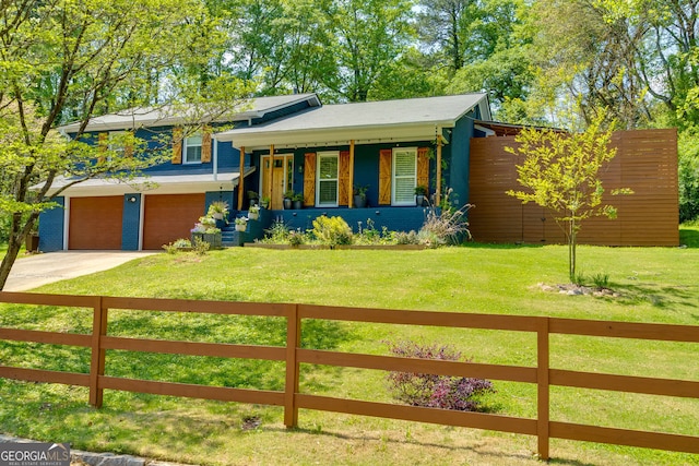 2673 Rainbow Forest Dr, Decatur, GA 30034 - tri-level home featuring fence, a porch, a front yard, and concrete driveway