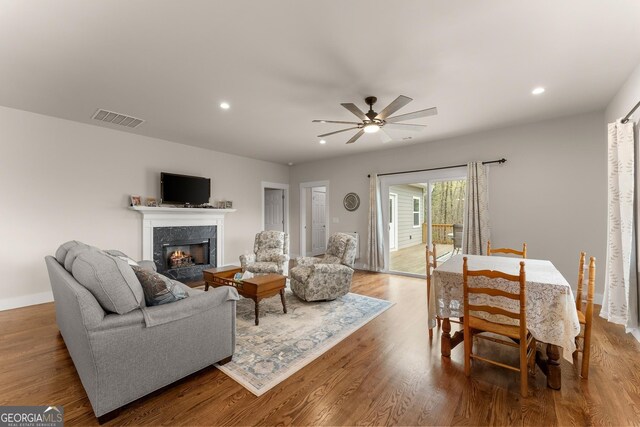 527 Abby, Clayton, GA 30525 - living area featuring a fireplace, a ceiling fan, recessed lighting, and wood finished floors