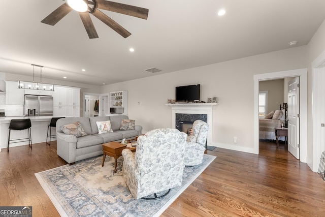 527 Abby, Clayton, GA 30525 - living area with a ceiling fan, wood finished floors, recessed lighting, and a fireplace