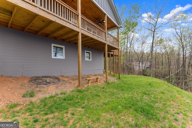 527 Abby, Clayton, GA 30525 - view of grassy yard featuring a ceiling fan and a deck
