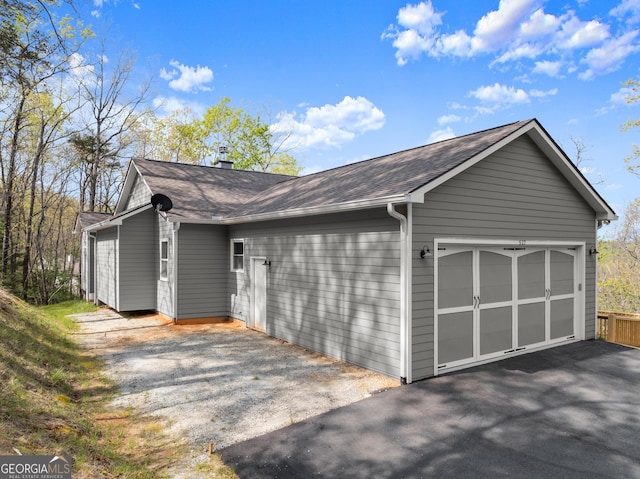 527 Abby, Clayton, GA 30525 - garage featuring asphalt driveway