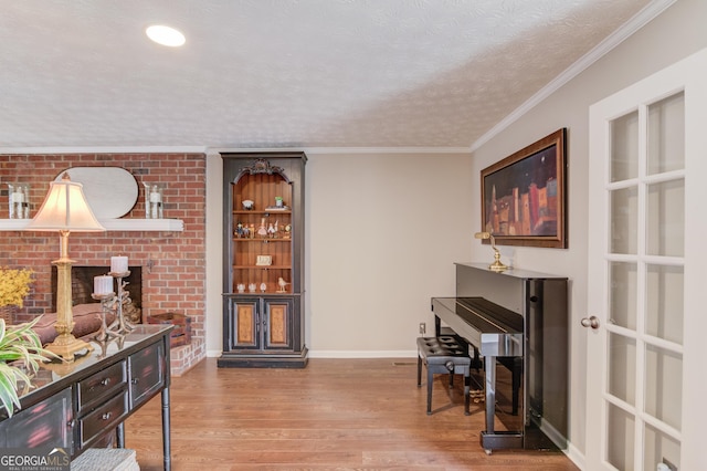sunroom / solarium featuring a wood stove and a wealth of natural light