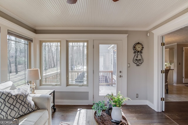 dining room with light tile patterned flooring, crown molding, baseboards, and an inviting chandelier