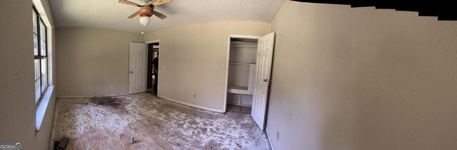 91 Lee Edwards Dr, Lafayette, GA 30728 - unfurnished bedroom with ceiling fan, concrete floors, vaulted ceiling, and baseboards