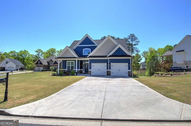 17 Ivy Stone Ct SE, Cartersville, GA 30120 - craftsman-style home featuring board and batten siding, an attached garage, stone siding, and a front yard