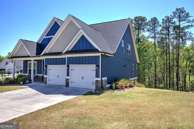 17 Ivy Stone Ct SE, Cartersville, GA 30120 - craftsman-style home featuring concrete driveway, board and batten siding, stone siding, roof with shingles, and a front yard