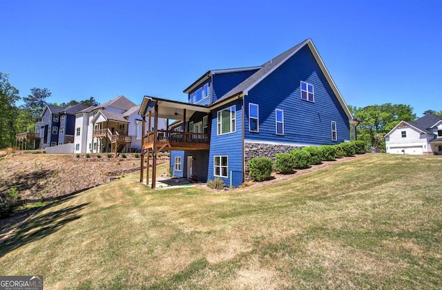 17 Ivy Stone Ct SE, Cartersville, GA 30120 - back of property featuring a lawn and stone siding