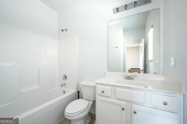 bathroom with toilet, vanity, and tub / shower combination