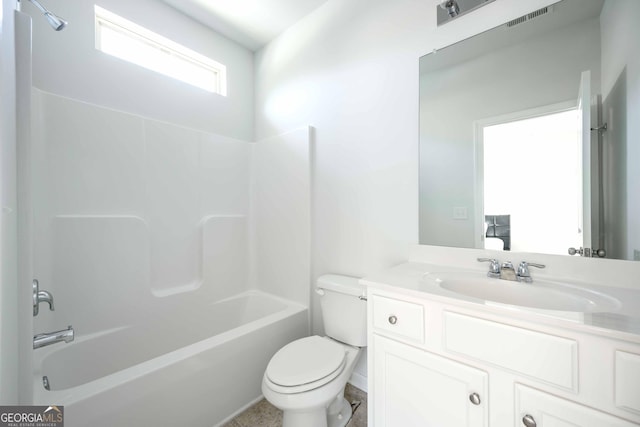bathroom with vanity, visible vents, shower / tub combination, and toilet