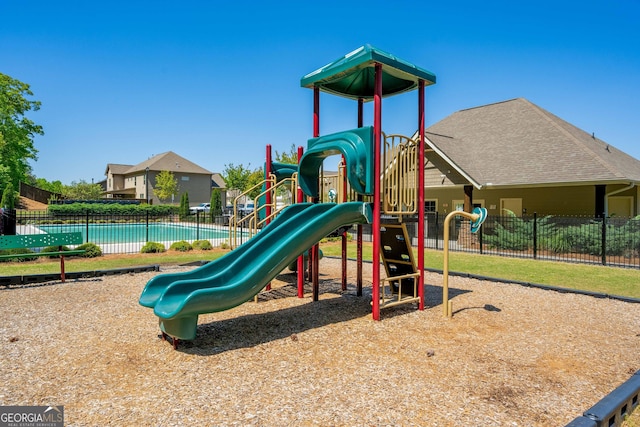 community play area featuring fence