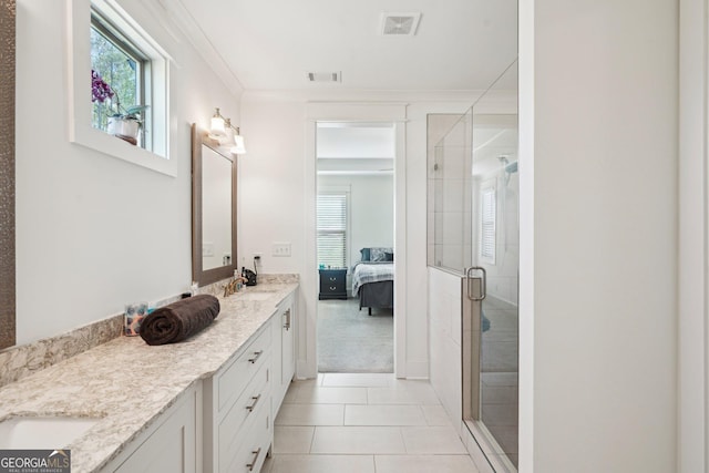 ensuite bathroom featuring ensuite bath, a healthy amount of sunlight, double vanity, and a stall shower