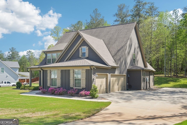 craftsman-style house featuring concrete driveway, a front lawn, a shingled roof, and a garage