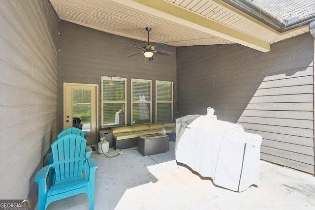 view of patio / terrace with an outdoor living space and ceiling fan