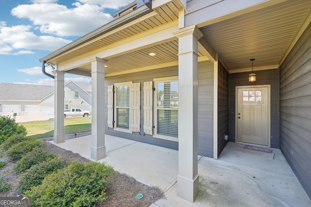 doorway to property with a porch
