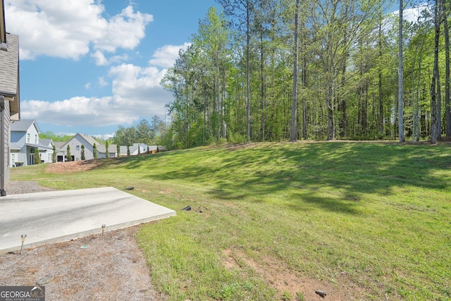 view of yard featuring a residential view