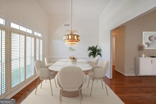 15 Boxelder Ct, Dallas, GA 30132 - dining room with visible vents, an inviting chandelier, dark wood-type flooring, and ornamental molding
