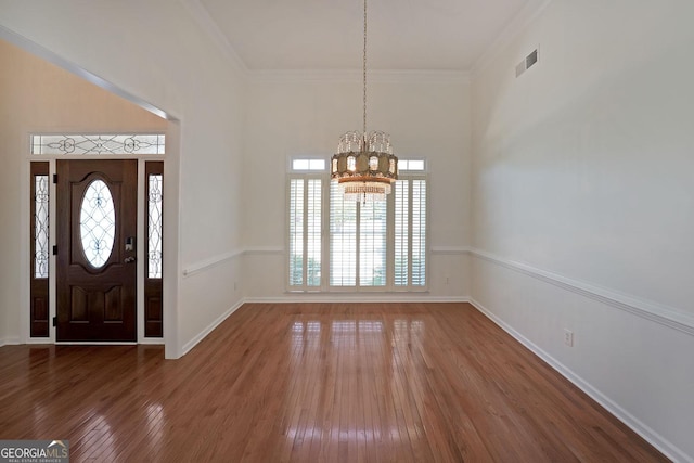 15 Boxelder Ct, Dallas, GA 30132 - entrance foyer with hardwood / wood-style floors, visible vents, baseboards, and a notable chandelier