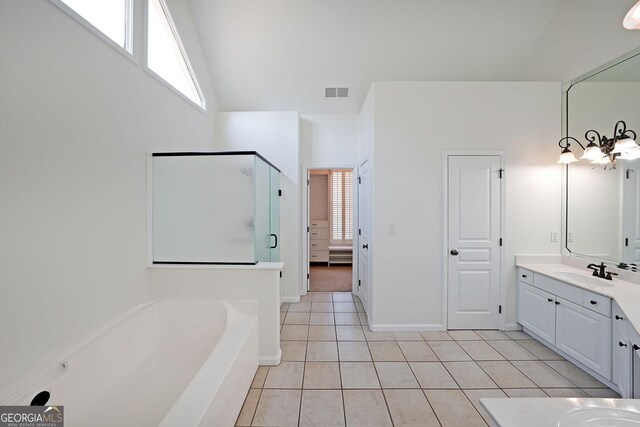 15 Boxelder Ct, Dallas, GA 30132 - bathroom with a shower stall, tile patterned floors, visible vents, vanity, and a bath