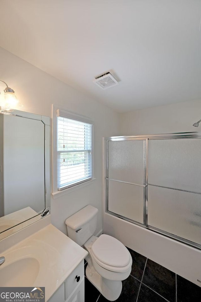 15 Boxelder Ct, Dallas, GA 30132 - bathroom with shower / bath combination with glass door, tile patterned floors, visible vents, toilet, and vanity