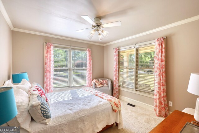 4157 Town Branch Ct SW, Covington, GA 30014 - bedroom with a ceiling fan, visible vents, carpet floors, baseboards, and ornamental molding