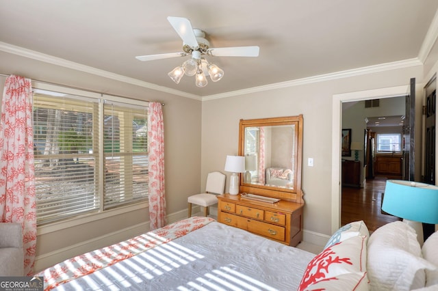 4157 Town Branch Ct SW, Covington, GA 30014 - bedroom with crown molding, baseboards, visible vents, and multiple windows