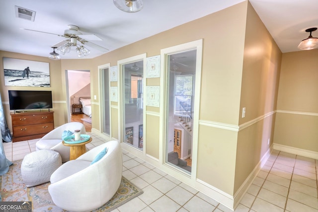 4157 Town Branch Ct SW, Covington, GA 30014 - interior space featuring tile patterned flooring, baseboards, ceiling fan, and visible vents