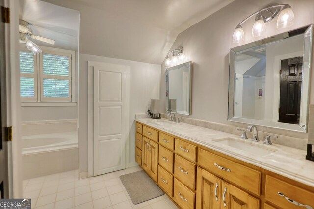 4157 Town Branch Ct SW, Covington, GA 30014 - full bathroom featuring a sink, tile patterned floors, double vanity, and lofted ceiling