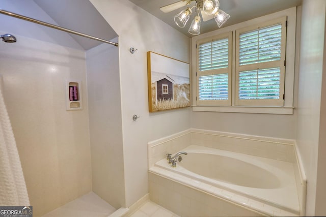 4157 Town Branch Ct SW, Covington, GA 30014 - bathroom with a ceiling fan, tile patterned flooring, a garden tub, and a shower