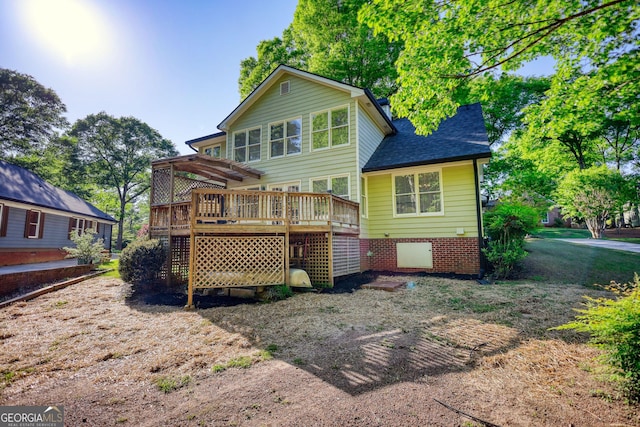 4157 Town Branch Ct SW, Covington, GA 30014 - back of house with roof with shingles, a wooden deck, and a pergola