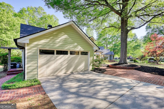 4157 Town Branch Ct SW, Covington, GA 30014 - view of side of property with a detached garage