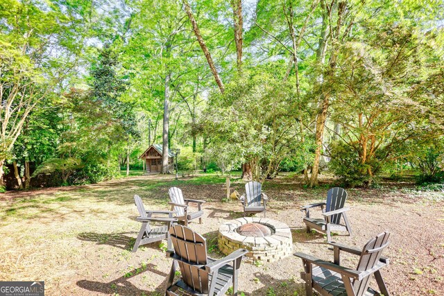 4157 Town Branch Ct SW, Covington, GA 30014 - view of yard with a fire pit