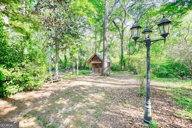4157 Town Branch Ct SW, Covington, GA 30014 - view of yard with an outbuilding