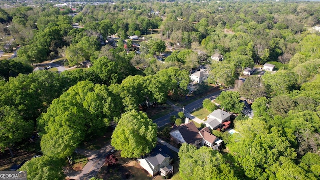 4157 Town Branch Ct SW, Covington, GA 30014 - drone / aerial view featuring a view of trees